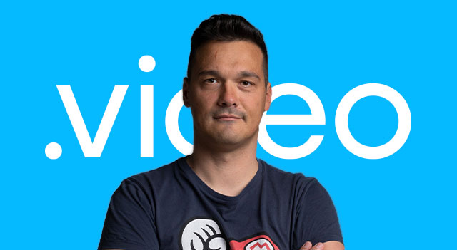 Headshot of Videographer creative studio with colorful background
